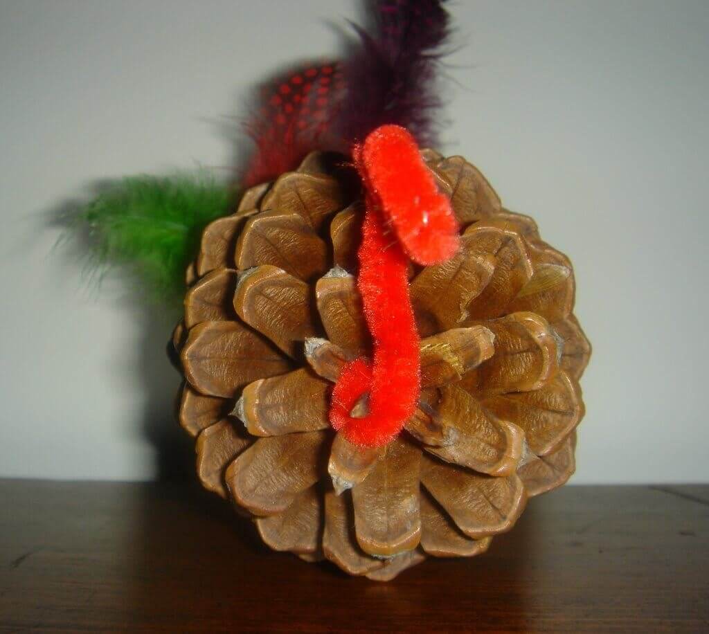 turkey made of pine cone and pipe cleaner