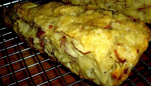 These scones are flaky, not-too-sweet, and almond-packed treats for breakfast. They make a nice change from a usual routine of oatmeal and toast and feel quite festive this time of year. Any other nut, fruit or flavoring can be substituted for the almonds and the dough freezes beautifully. Enjoy! // alexandracooks.com