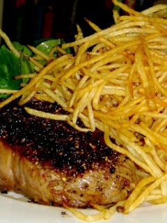 If you have a deep-fryer at home, recreating these classic steak frites is quite simple; if you don't, the process of frying the potatoes will just be slightly more involved. I've supplied a recipe for a spicy aioli, which is delicious with frites. It yields more than enough for two servings of frites and will keep for weeks in the refrigerator. // alexandracooks.com