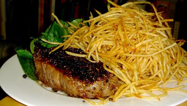 If you have a deep-fryer at home, recreating these classic steak frites is quite simple; if you don't, the process of frying the potatoes will just be slightly more involved. I've supplied a recipe for a spicy aioli, which is delicious with frites. It yields more than enough for two servings of frites and will keep for weeks in the refrigerator. // alexandracooks.com