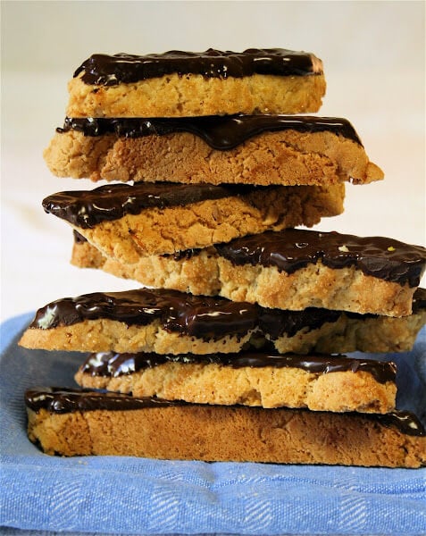 A stack of biscotti dipped in chocolate.