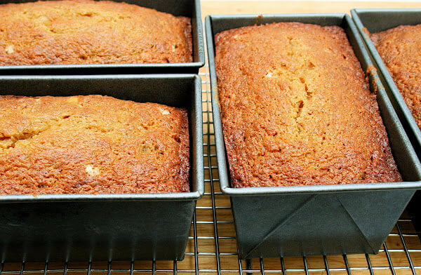 Loaf pans filled with pawpaw quick bread.