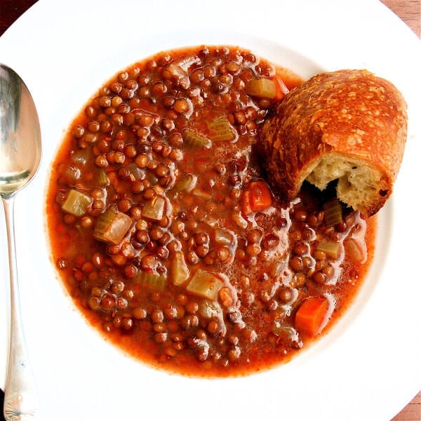 Lentil soup and bread for dinner might seem a little Spartan, but this soup is filled with vegetables for one, and lentils themselves are nutritional powerhouses: These little legumes are high in fiber, protein, vitamins and minerals and are an excellent source of complex carbohydrates. // alexandracooks.com