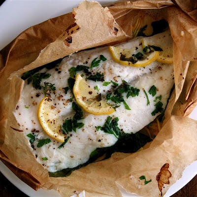 By keeping the fish piping hot, the fish en papillote method helps you eat more slowly, allowing you to savor your dinner, which I appreciate. // alexandracooks.com