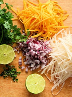 Frozen halibut steaks fried up beautifully for these fish tacos, and once wrapped in the tortilla, spread with a dab of sriracha-sour cream and topped with this tasty slaw, the fish becomes a second-string player. // alexandracooks.com