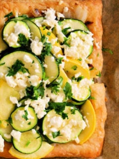 Summer squash tart with feta. Made with puff pastry. Simple and delicious.