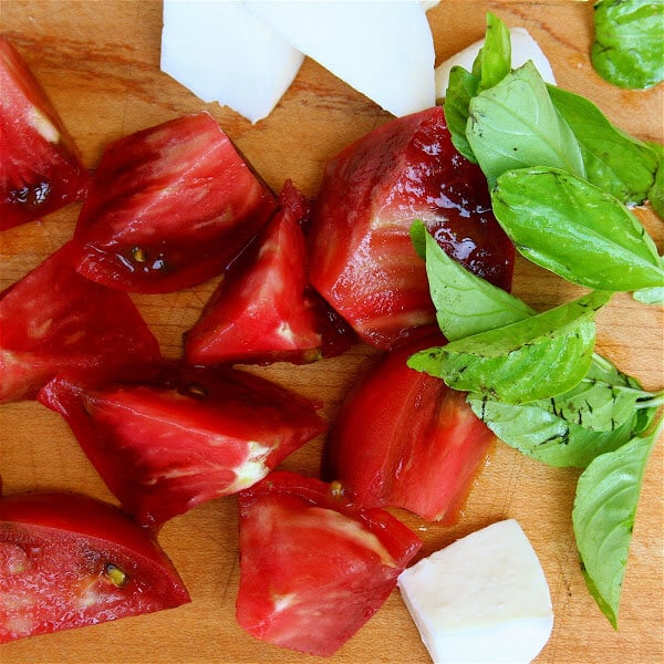 Caprese salad has been done to death. But there's a reason it appears on nearly every restaurant menu come summertime: It's so unbelievably good. I promise I'm not trying to bore you. I just have a few things to add, in an effort, I hope, to maximize your tomato-eating experience this summer. // alexandracooks.com