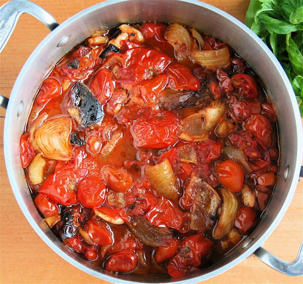 This roasted tomato soup has been made completely to taste. If you start with a base of slow roasted tomatoes, onions, garlic and shallots, I assure you your soup will be a success. Served with a few shavings of Parmigiano Reggiano and a piece of crusty bread, it makes a wonderful late summer meal. // alexandracooks.com