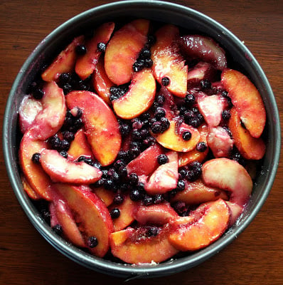 Whatever pastry is used in this peach blueberry cake, which I have been snacking on morning and night for the past two days, must be strong enough to support a thick layer of juicy, oozing fruit. And in an ideal world, it must be moist and delicious, too. // alexandracooks.com