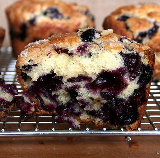 A halved lemon-blueberry muffin. 