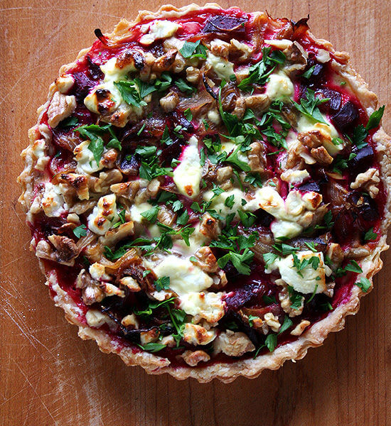 This goat cheese walnut tart is really fun. And different. And delicious. I can't promise a quick-and-easy dinner with this recipe — beets must be roasted; a tart shell must be baked — but with a little planning, assembly of this tart is quite simple. And it is so worth the effort. // alexandracooks.com