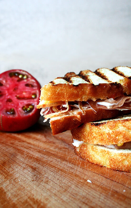 This sandwich, with toasted bread, rubbed with garlic, drizzled with olive oil, sprinkled with salt, moistened with a squeezed tomato and topped with jamón Iberico, is easily the most delicious sandwich on the face of the earth. // alexandracooks.com