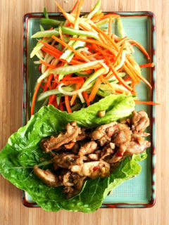 These Asian lettuce wraps are simple to prepare, stunning to serve, and exceptionally satisfying to eat. Both the slaw and the meat are incredibly flavorful and the combination of the crunchy cool slaw with the tender hot meat is so yummy. Make it. You'll be happy. I promise. // alexandracooks.com