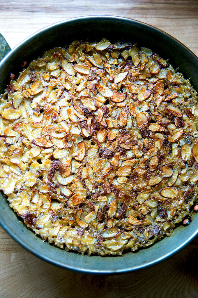 A bowl of freshly baked steel cut oatmeal with almonds.