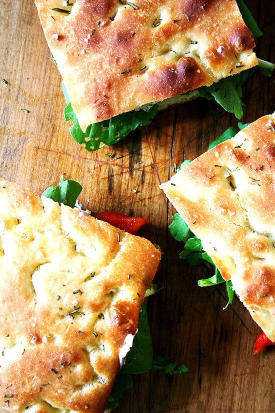 Next time you are invited to a potluck picnic, volunteer to make sandwiches. And then make these roasted red pepper and arugula sandwiches on homemade focaccia. You will be loved forever. I promise. // alexandracooks.com