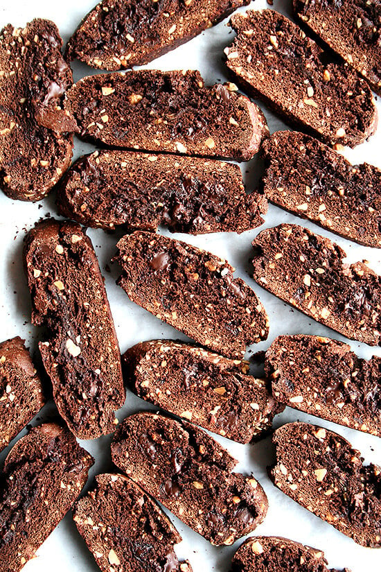 These chocolate biscotti are divine. Perfectly sweet. Not too hard. Crumbly. Soft. Not too soft. Loaded with chocolate and studded with almonds. A perfect accompaniment to a cup of coffee. I am convinced there is no better way to start the morning (and mid-morning and afternoon and early evening, etc.). // alexandracooks.com