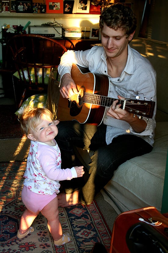 My brother playing guitar with Ella. 