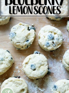 Unbaked lemon blueberry scones on a sheet pan.