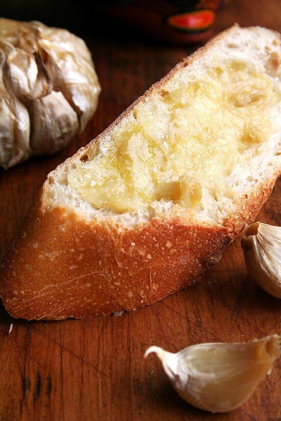 Bread spread with whole roasted garlic and sea salt. 