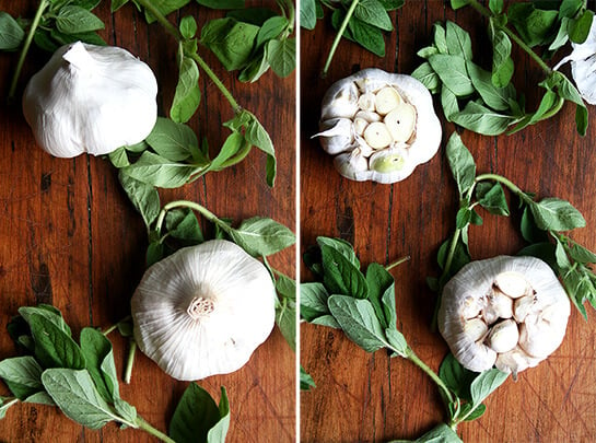 Garlic & Oregano on a board.