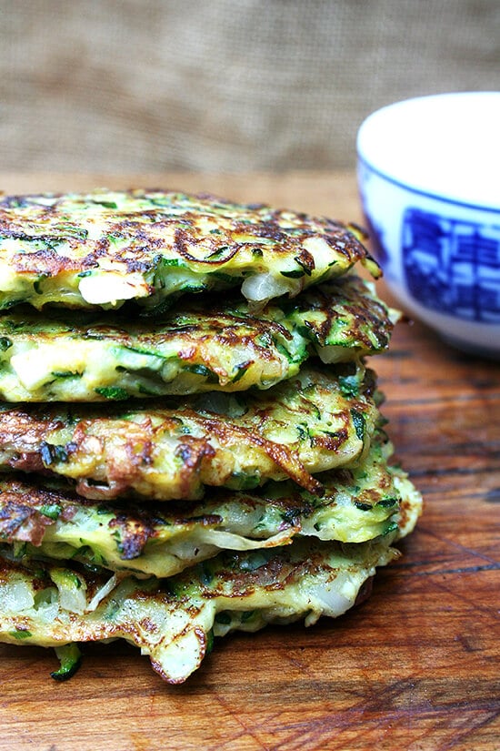 A combination of grated zucchini and potato with a little diced onion give these zucchini fritters a lovely latke texture. But the addition of lemon zest and lots of herbs give them a freshness and lightness that's irresistible. // alexandracooks.com