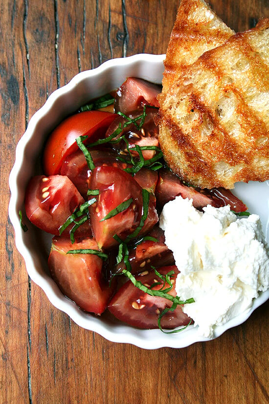 Could anything be more satisfying than this simple lunch this time of year? Homemade ricotta, Olin-Fox Farms CSA tomatoes, and grilled bread. Yum Yum Yum! // alexandracooks.com