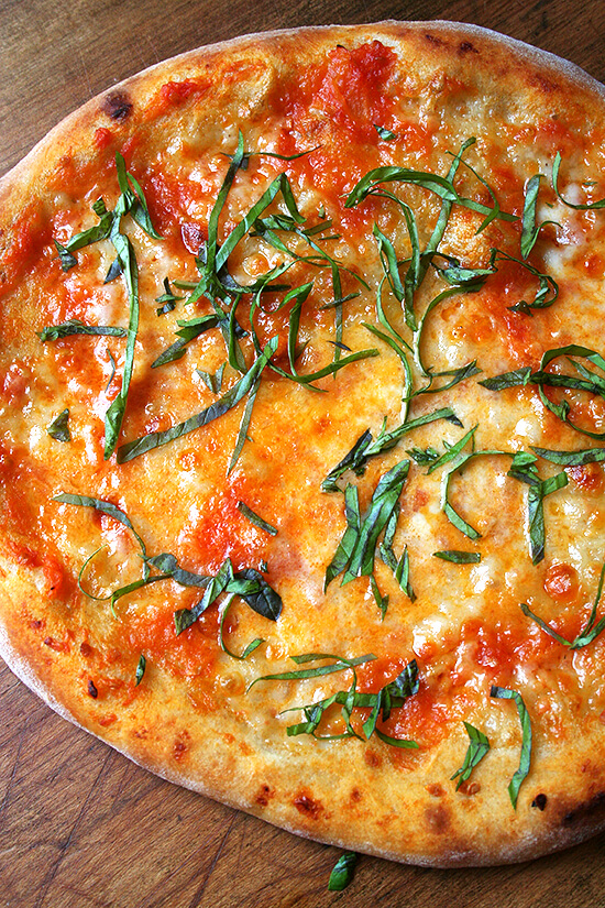 With the help of Marcella Hazan's homemade tomato sauce, classic pizza margherita can be achieved at home with delectable results. And thanks to the Barefoot Contessa, making homemade ricotta is easy and delicious. // alexandracooks.com