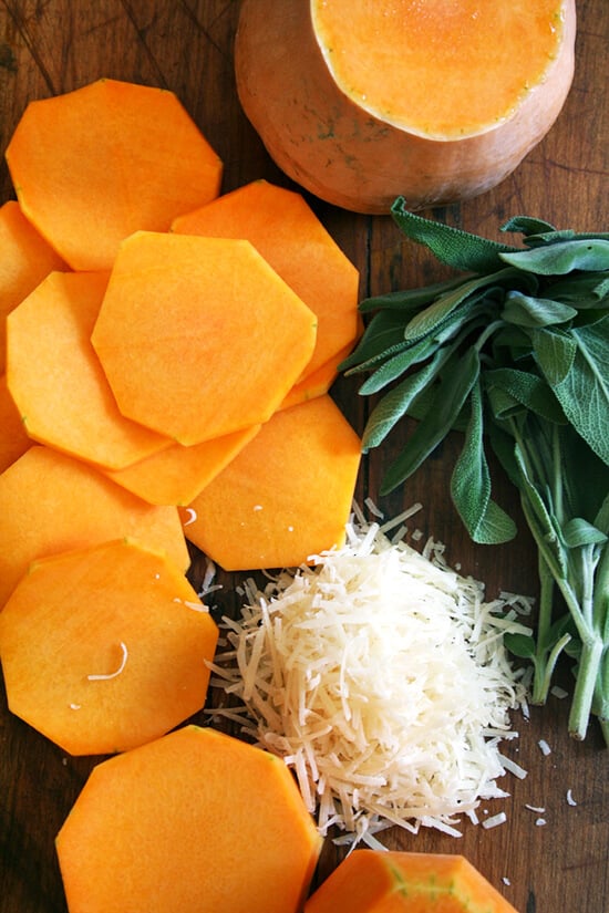 butternut squash, sage, and Parmigiano Reggiano on a board 