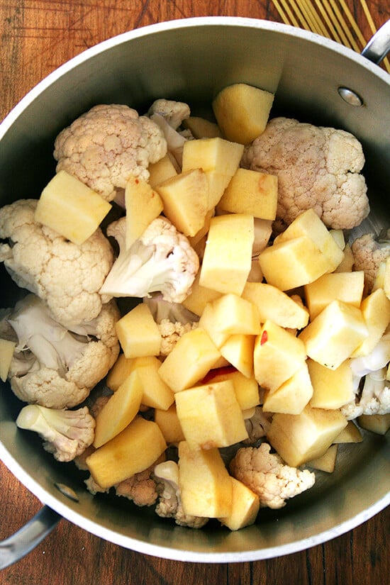 cauliflower and apples in soup pot