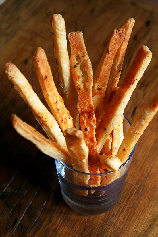 Spicy, salty, crispy — these cheese sticks are addictive and will never not appear at a party I host from here on out. They take just minutes to whip up. They look beautiful. And they couldn't be more party friendly — who doesn't like butter, cheese, salt and a little spice? // alexandracooks.com
