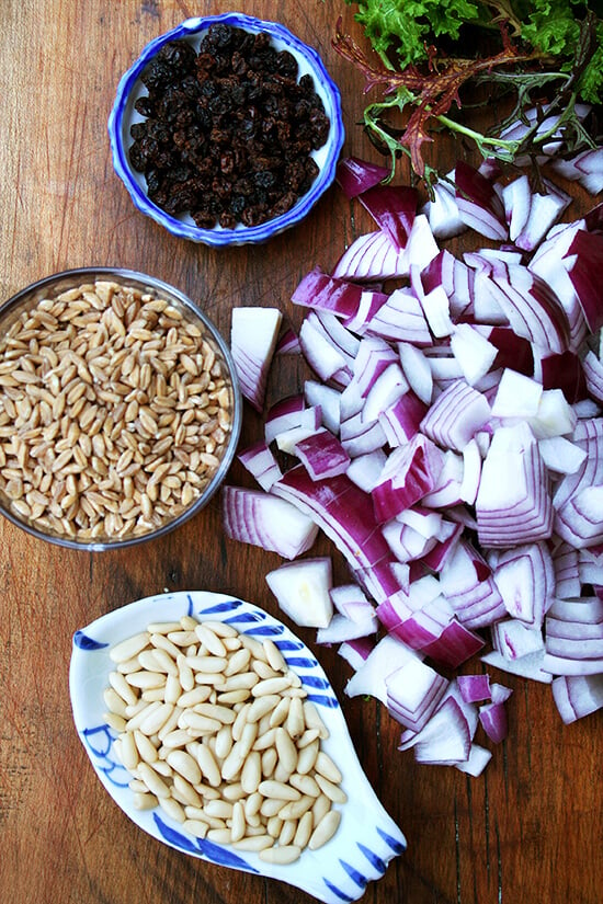 Ingredients for farro salad on a board. 