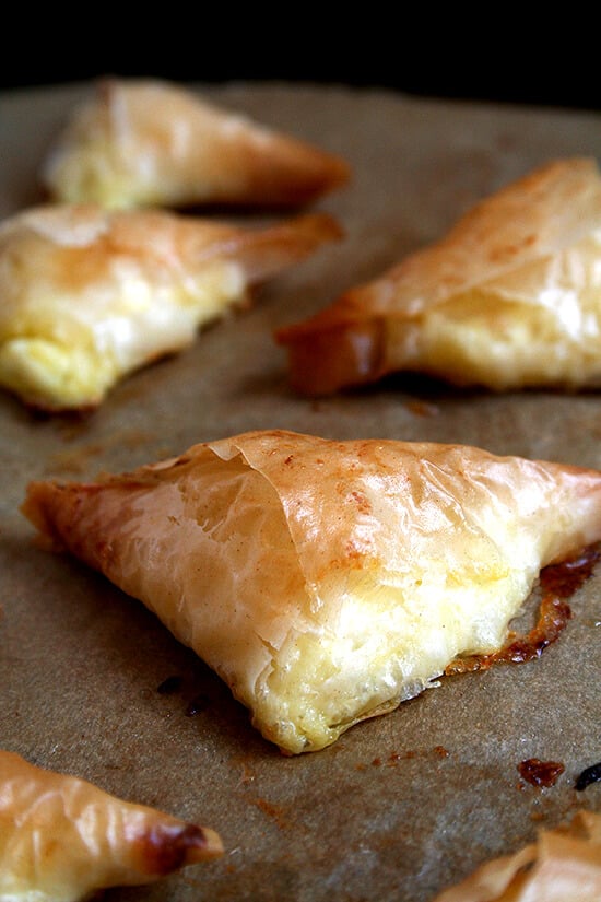 A sheet pan of just-baked tiropitas.