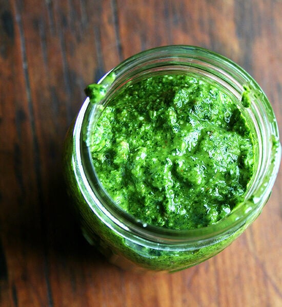 A jar of homemade pesto sauce.