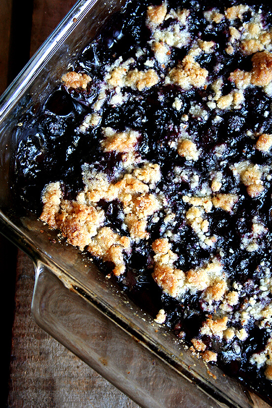 Like most crisps, this lemon blueberry crisp takes no time to prepare, and if you have a food processor, the topping — a mixture of flour, sugar, almonds and butter — comes together in seconds. The absence of oats and brown sugar in this crisp topping makes it particularly light and allows the lemon-sugared blueberries to really shine. // alexandracooks.com