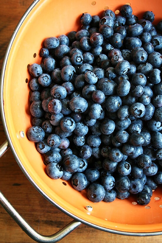 colander with blueberries