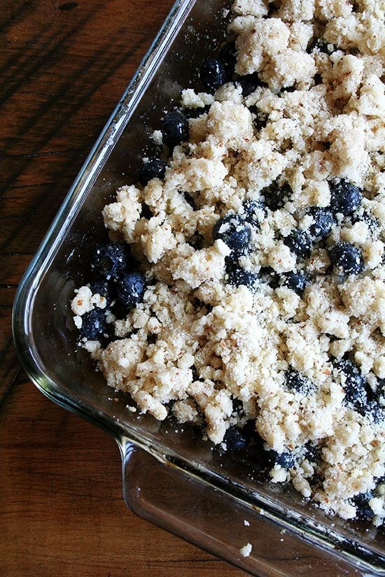 Like most crisps, this lemon blueberry crisp takes no time to prepare, and if you have a food processor, the topping — a mixture of flour, sugar, almonds and butter — comes together in seconds. The absence of oats and brown sugar in this crisp topping makes it particularly light and allows the lemon-sugared blueberries to really shine. // alexandracooks.com