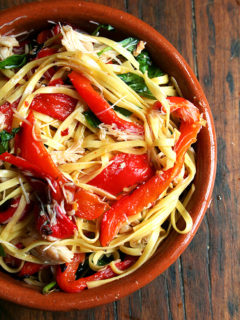 The addition of a can of crabmeat to this favorite summer linguine dish not only made it a touch tastier but also a smidgen more complete, especially for those who don't consider a sprinkling of cheese a suitable protein. // alexandracooks.com