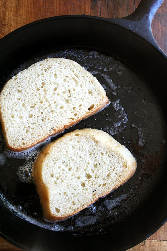 bread toasting in cast iron