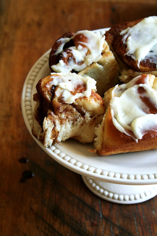 cinnamon rolls on cake stand