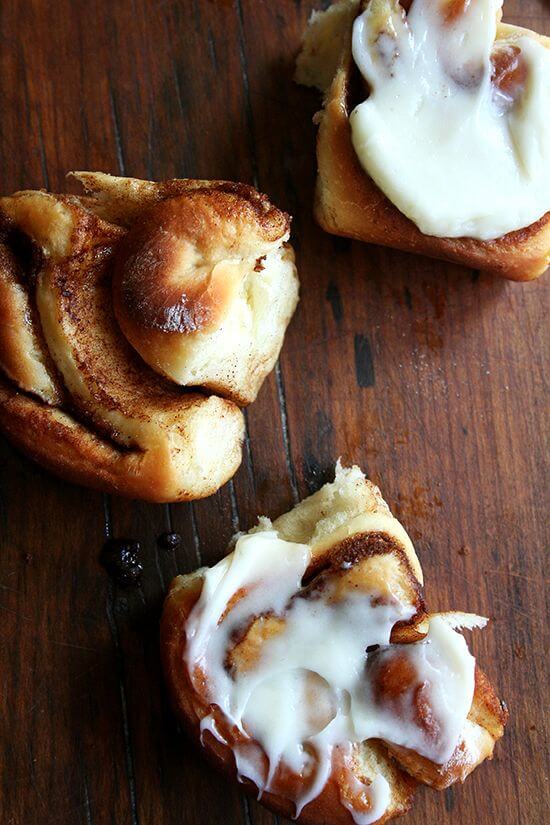 Overhead shot of cinnamon rolls on a table.