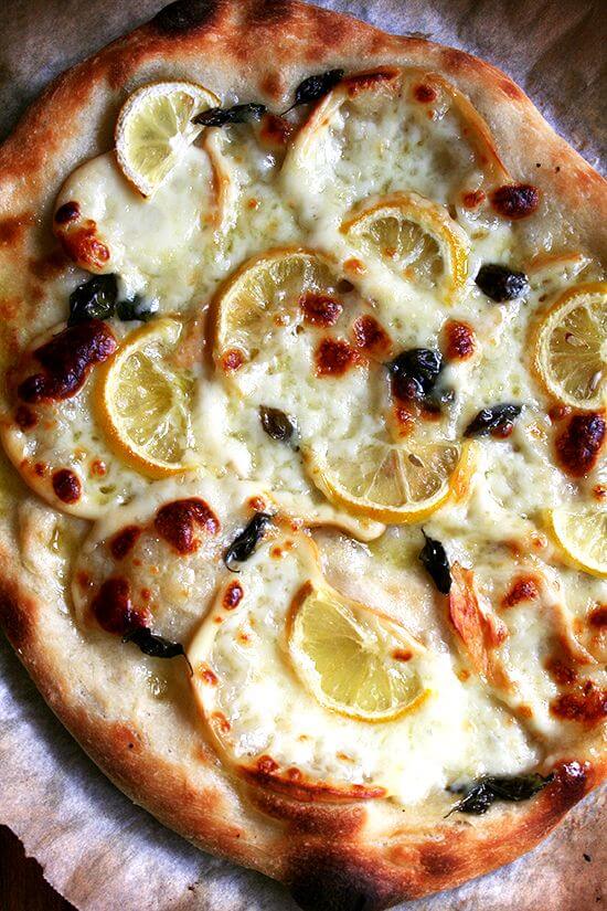 A just-baked lemon and smoked mozzarella pizza.