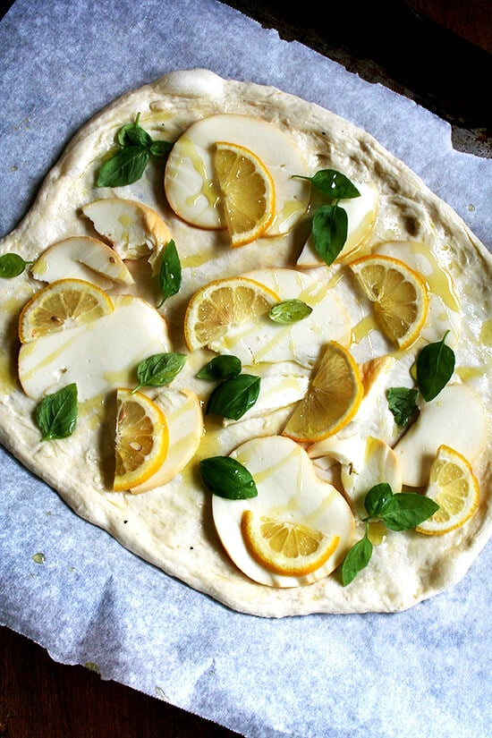 A lemon pizza, unbaked.