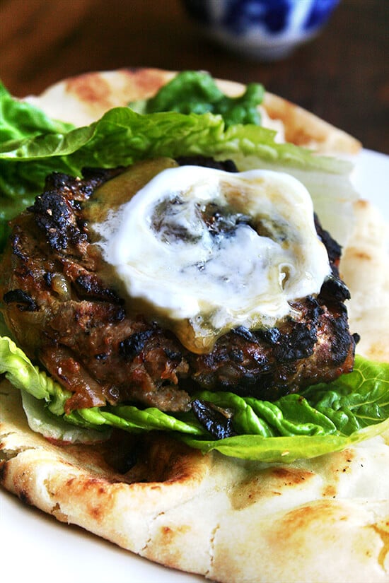 Seasoned with curry powder and cumin as well as caramelized onions and a dollop of chutney mustard, these lamb burgers might just be what you need to re-awaken those palates in this uninspiring in-between-seasons period. Serving the burgers in half pieces of warm naan with some crisp lettuce makes for a nice change from the standard burger bun. Cheese doesn't seem to fit here, but something cool and tangy like Greek yogurt is a must. // alexandracooks.com