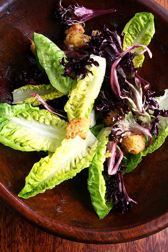 simple salad tossed with mustard croutons