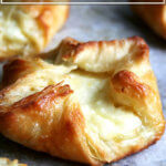 Just-baked cheese danish on a sheet pan.