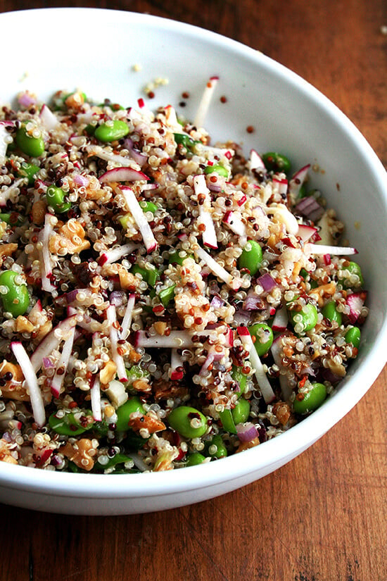 A simple dressing of olive oil and freshly squeezed lemon juice with just a pinch of crushed red pepper flakes works best in this quinoa salad, both complementing quinoa's flavors while not oversaturating its delicate texture. // alexandracooks.com