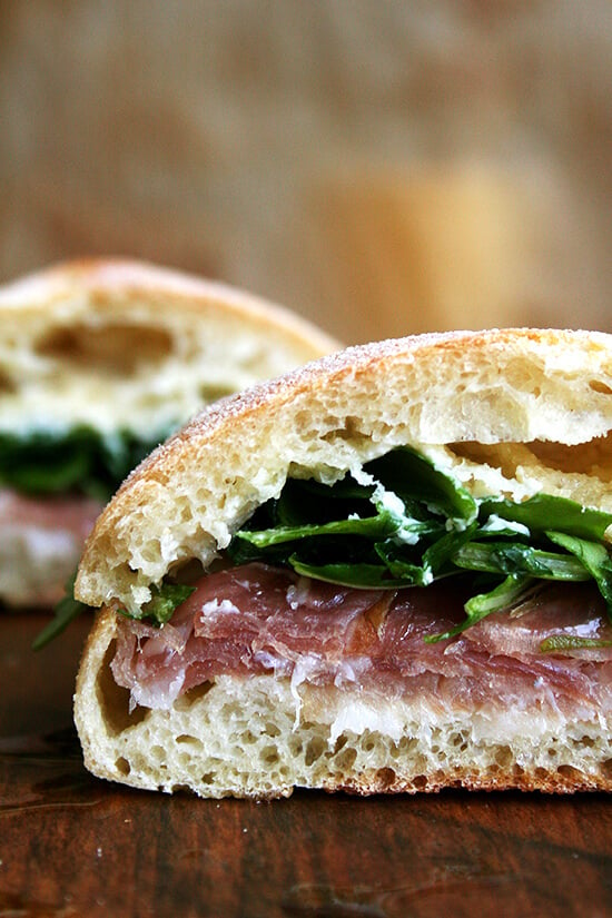 For Gabrielle Hamilton, the success of this prosciutto and arugula sandwich relies on a delicate balance, "the perfection of three fats together — butter, olive oil, and the white fat from prosciutto or lardo." Served on (faux) ciabatta bread, it's delicious. // alexandracooks.com