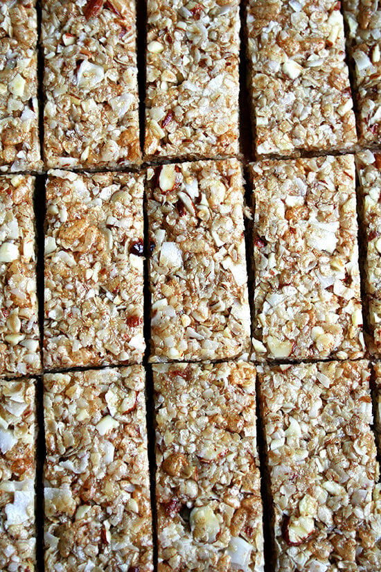 These are the ideal no-bake granola bar for me: tasty and incredibly chewy, containing healthful ingredients, no processed cereals, and no candy-like additions. The dry mixture contains oats, sliced almonds, unsweetened coconut, and wheat germ, but this mixture can be tailored to your liking with dried fruit, nuts, seeds, wheat bran, oat bran, chocolate chips, etc. // alexandracooks.com