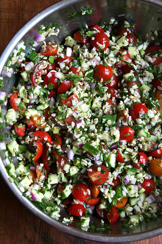 With little more than a knife, a cutting board, and a large bowl, a beautiful whole grain salad can materialize in no time. Tabbouleh, a dish my mother made for us all summer long for as long as I can remember, a dish that feels at once light, satisfying and nourishing. With some warm pita and a block of feta, dinner is served. // alexandracooks.com