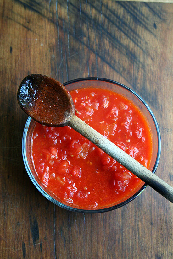 A bowl of barely cooked tomato sauce.